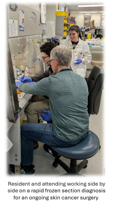 Resident and attending working side by side